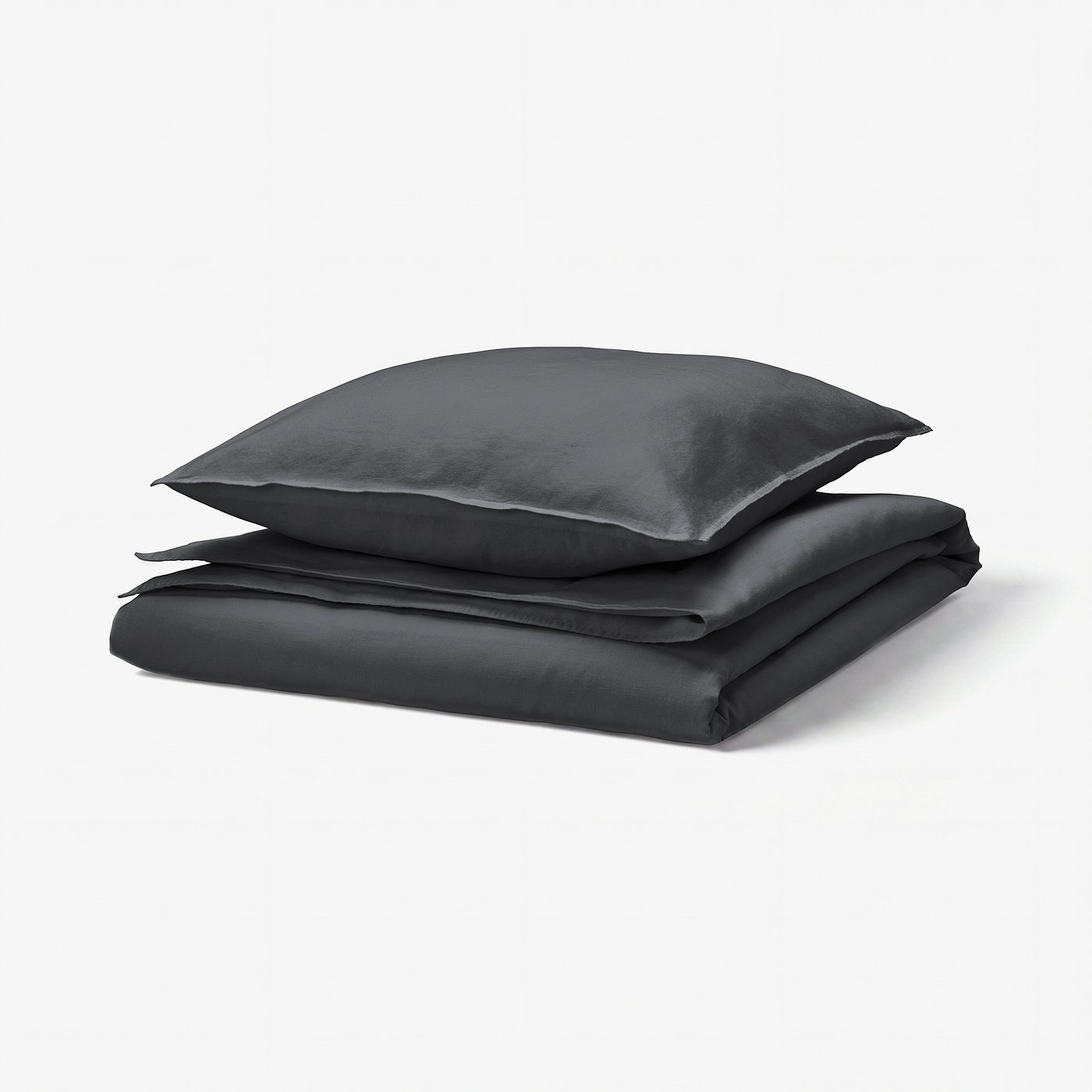 Dark grey RUNDHAGTORN bedding set, made of linen and cotton, folded neatly with zippered closure, casual and soft.