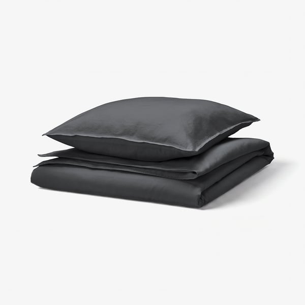 Image shows a folded, dark grey RUNDHAGTORN duvet set on white background. Material: 51% linen, 49% cotton.