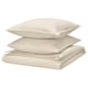 Beige bedding set, including duvet and pillows, made from soft cotton and linen, featuring a casual, wrinkle-chic design.