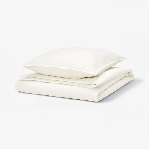 RUNDHAGTORN ivory duvet set, soft linen-cotton blend, neatly folded.