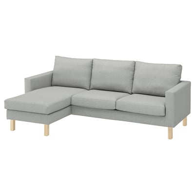 A grey SALTSJÖBADEN sectional sofa with a chaise. Its made of recycled polyester, featuring a modern, minimalist design with wooden legs.