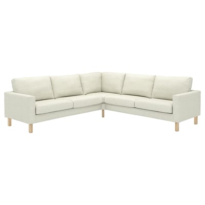 Modern cream-colored l-shaped sectional sofa with wooden legs, minimalist design.