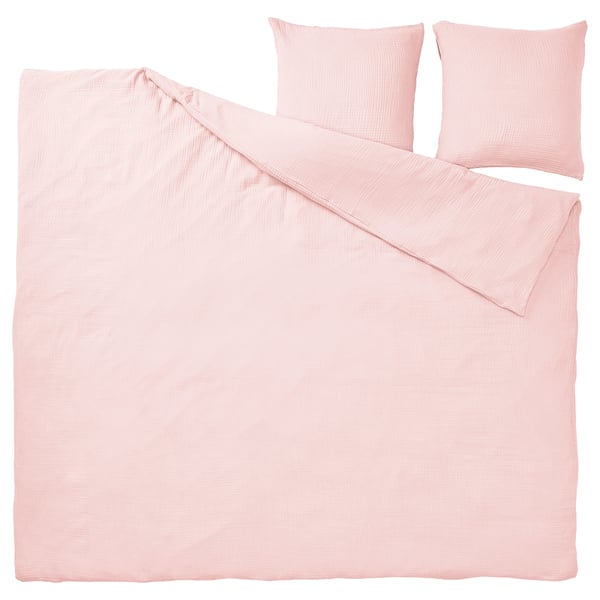 A light pink SCHERSMIN bedding set featuring a duvet cover and two pillowcases, crafted from soft organic cotton with a textured design.