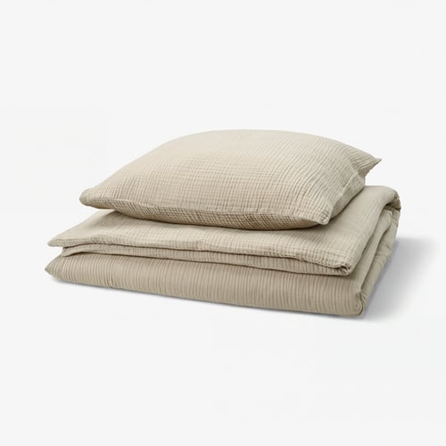 SCHERSMIN beige duvet set. Soft, organic cotton with wavy texture. Includes comforter and pillowcases.