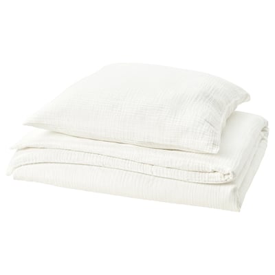 Folded white SCHERSMIN bedding set, pure cotton, textured.