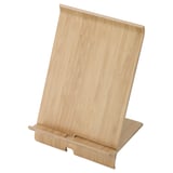 Brown bamboo phone stand with cable hole for movies and calls.