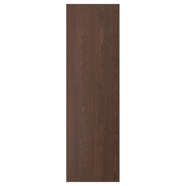 Is of a dark brown wooden panel with visible wood grain texture, likely a cabinet door or drawer front.