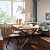 SKÅLSTA Table and 4 chairs, walnut effect X-shaped black-grey/walnut veneer profiled metal/black-grey, 140x80 cm