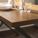 SKÅLSTA Table and 4 chairs, walnut effect X-shaped black-grey/walnut veneer profiled metal/black-grey, 140x80 cm
