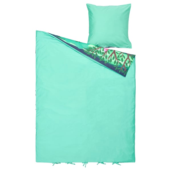 Teal green bedding set with mouse and mushroom design.