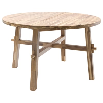 SKOGSTA: round dining table, natural acacia wood color, sturdy, light brown, four angled legs, simple design.