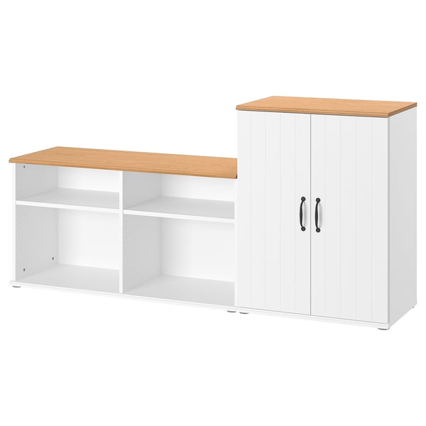 SKRUVBY white storage. Mix of open and closed shelves. Light wood top. Base white. Vertical door design.