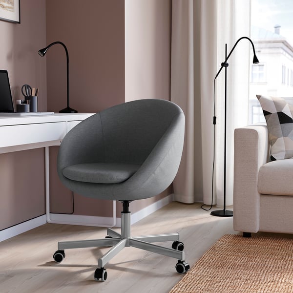 SKRUVSTA gray office chair, modern & adjustable near desk & sofa.