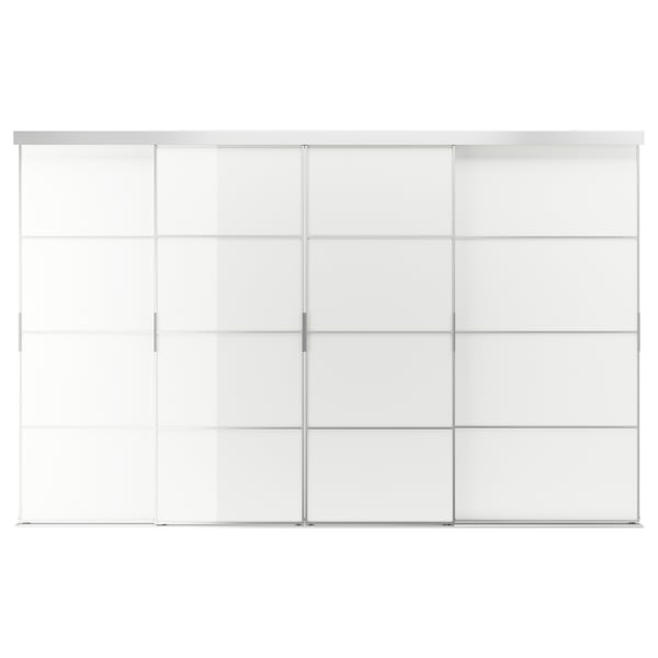 A SKYTTA sliding door with a silver frame and glass panels. Its a minimalist design, ideal for modern interiors.