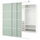 Option: A white SKYTTA wardrobe with light green glass doors and internal shelves.