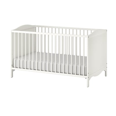 White wooden baby cot, rectangular and minimalist design, four raised legs, vertical slats on all sides for ventilation.