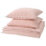 A stack of red and white striped bed linens, including a duvet cover and pillowcases, made of a cotton/viscose blend.