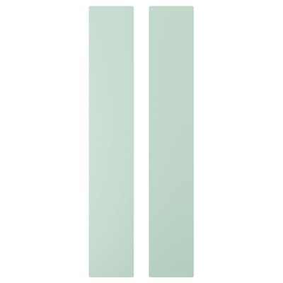 Two tall, light green, rectangular panels side by side.