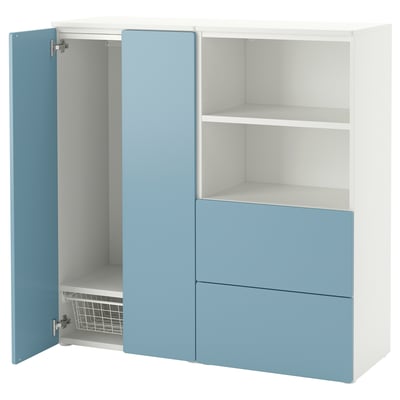 Blue and white kids wardrobe with drawers and shelves.
