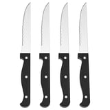 Four identical black-handled steak knives with serrated stainless steel blades, arranged in a row.