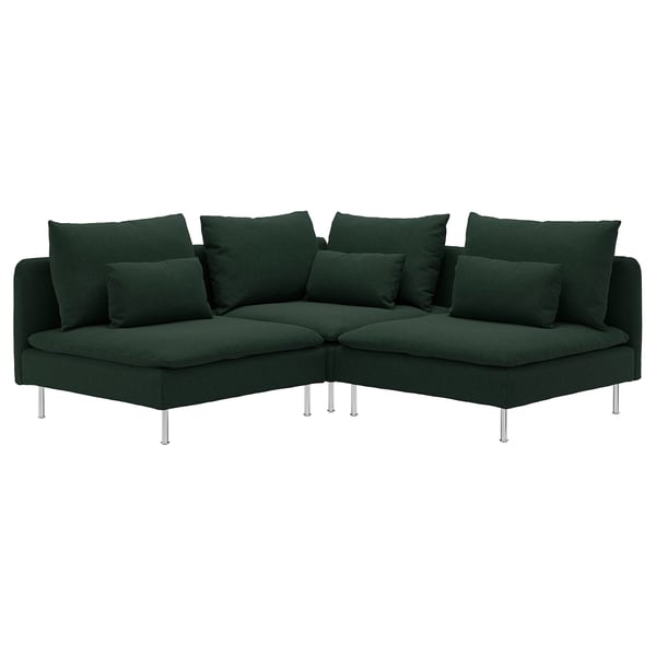 Dark green modern corner sectional sofa with numerous pillows, elevated on slim chrome legs.