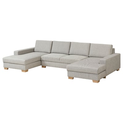 Modern grey corner sofa, SÖRVALLEN, light wooden legs, wraps around seating area.