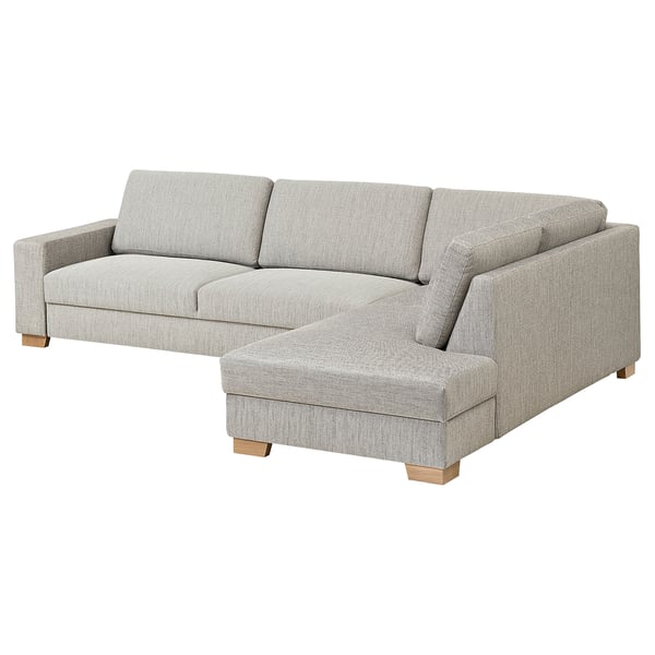 A grey SÖRVALLEN three-seat sofa with a minimalist design and light wooden legs.
