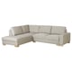 The SÖRVALLEN sectional sofa in light grey, featuring a modern scandinavian design, l-shaped with a chaise lounge, and supported by wooden legs.
