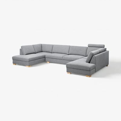 A modern, grey, u-shaped SÖRVALLEN sofa with wooden legs.