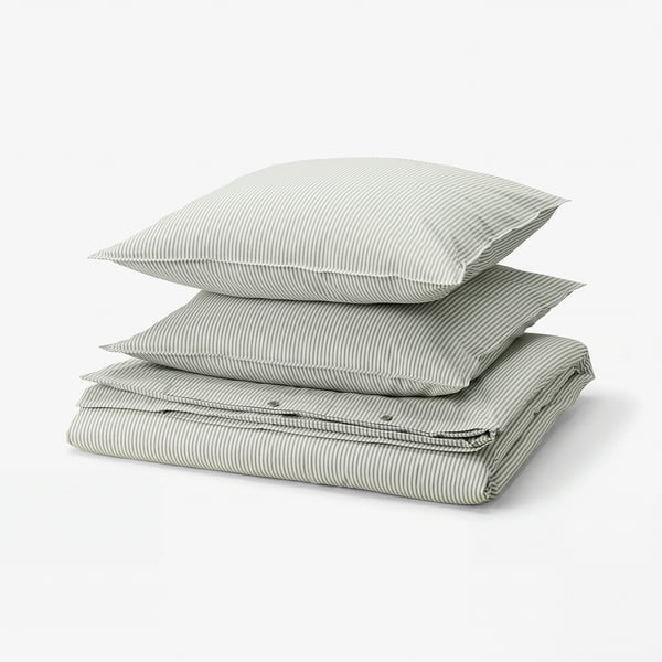 Stack of SOLFIBBLA green and white striped cotton bedding.
