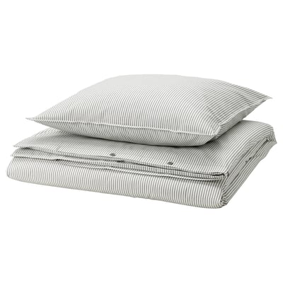 Stack of two gray and white striped cotton pillows, neatly folded.