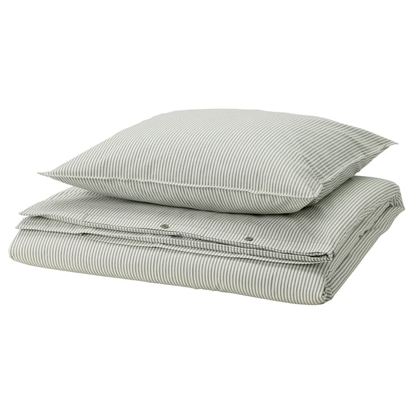 Stacked green striped bed linens: duvet cover and two pillowcases in cotton.