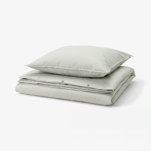 A SOLFIBBLA duvet set with green and white stripes, made of 100% cotton, neatly folded, square shape.