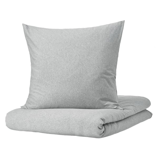 Light grey SPJUTVIAL bedding with a stretchy, soft jersey knit texture. Includes one pillowcase and a folded duvet cover, simple and cozy design.