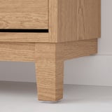 Modern wooden shoe cabinet with oak veneer. Clean lines and sturdy design.