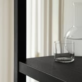 Wooden shelf with vase and cup, scandinavian style.