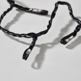 Black twisted led light chain with bright lights for festive decor.