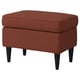 Bright red upholstered footstool, four tapered black wooden legs, soft cushioned top, rectangular shape.