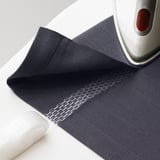 Hemming iron in use; eaSY fabric finish.