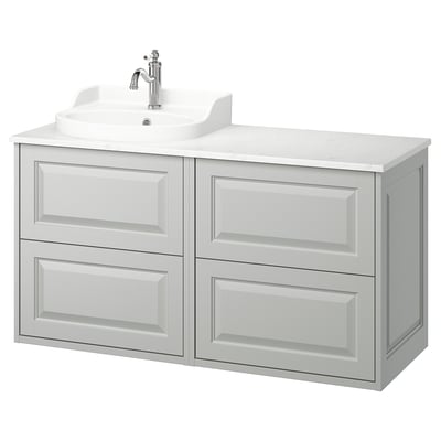 White tannforsen bathroom vanity, marble counter, chrome faucet.