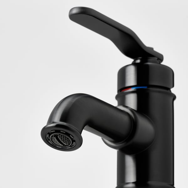 Black modern tap with sleek handle and aerated spout, showcasing high-quality design and durability.