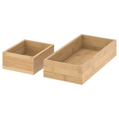 Two bamboo storage trays, natural, rectangular, simple design, ideal for organization.
