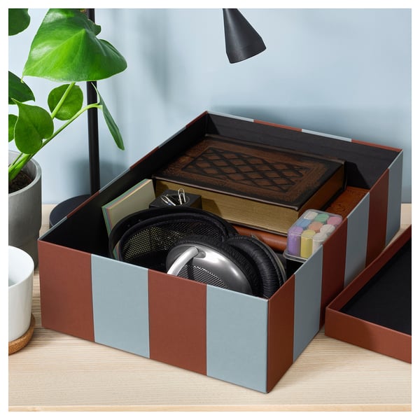 TJENA organizer box with headphones and office supplies