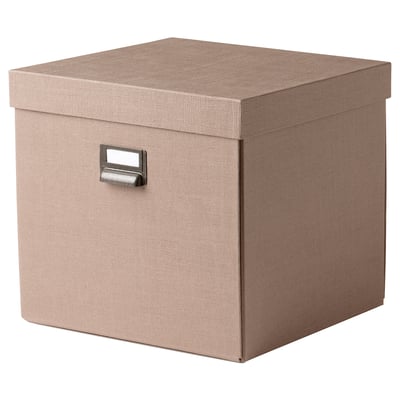 TJOG storage box, beige, rectangular, fabric-like texture, metal handle, simple design.