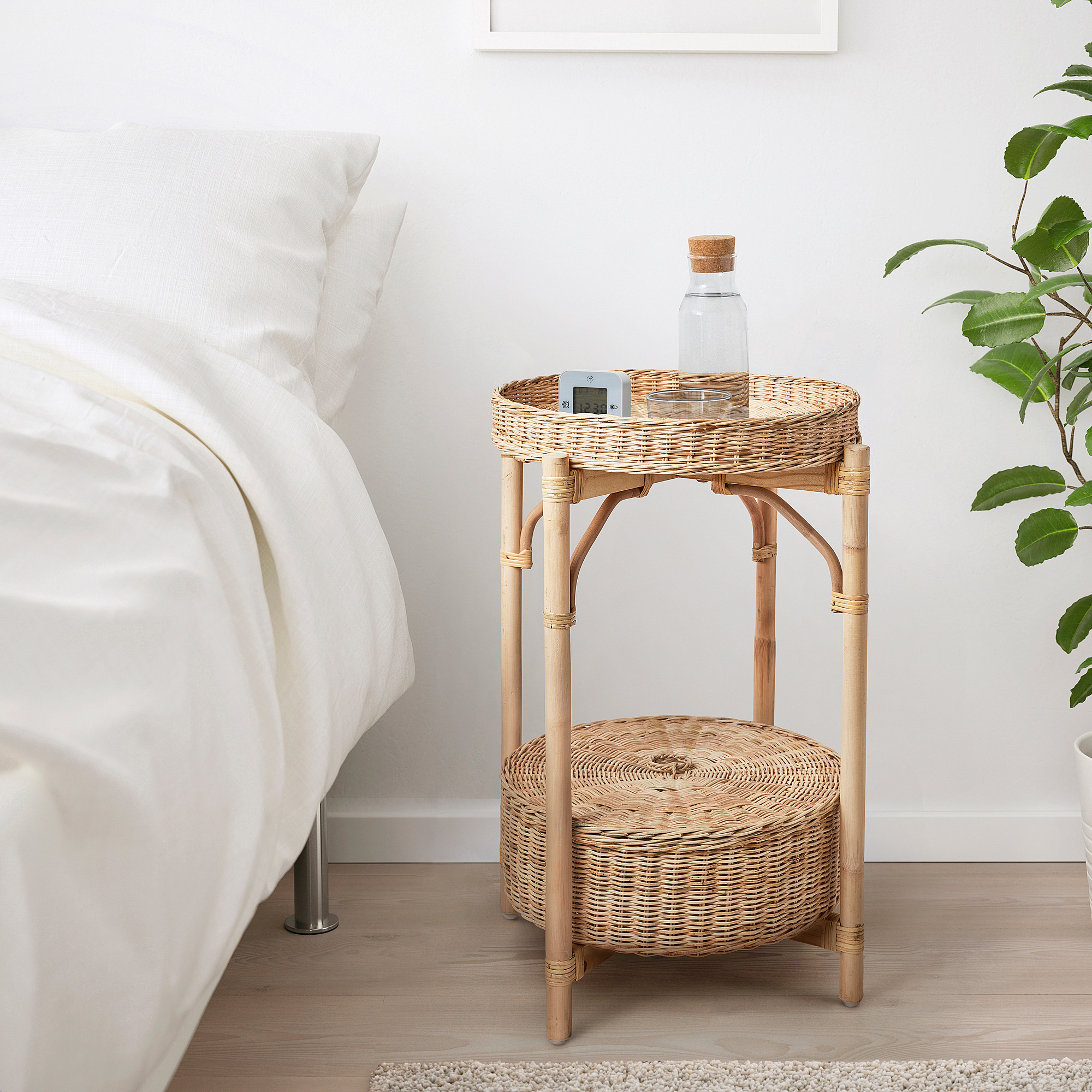 TOLKNING wicker side table with removeable tray beside bed, light wood, round.