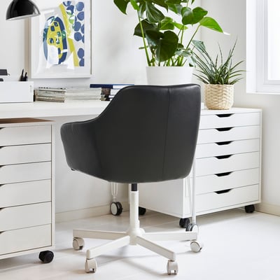 Home office: TOSSBERG chair, desk, plants, artwork