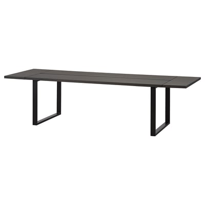 A dark gray TRANEBO dining table with metal legs and a rectangular shape, perfect for modern dining spaces.