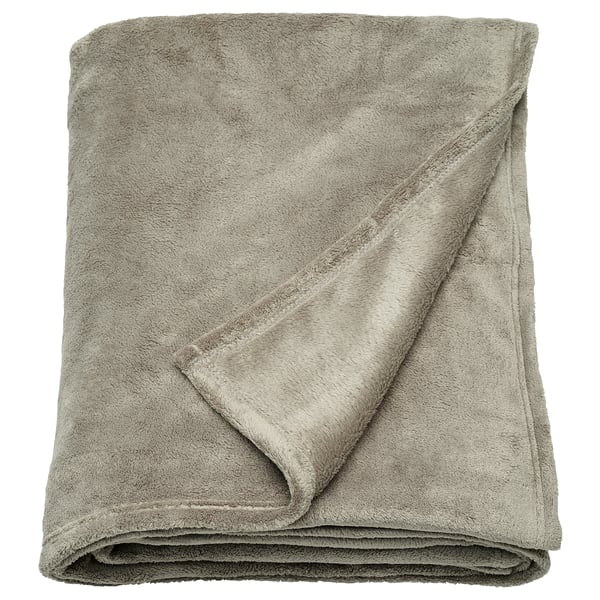 TRATTVIVA: light green, recycled polyester fleece blanket, folded soft and cozy.