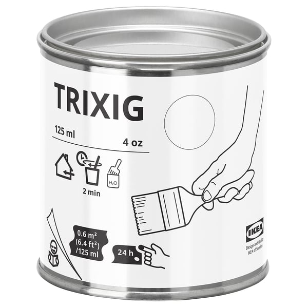 A white cylindrical can of ikea TRIXIG paint, showing black text and graphics, designed for indoor furniture painting.