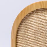 Close-up of a wooden cat scratcher, showcasing its robust natural fibers and smooth, durable finish.